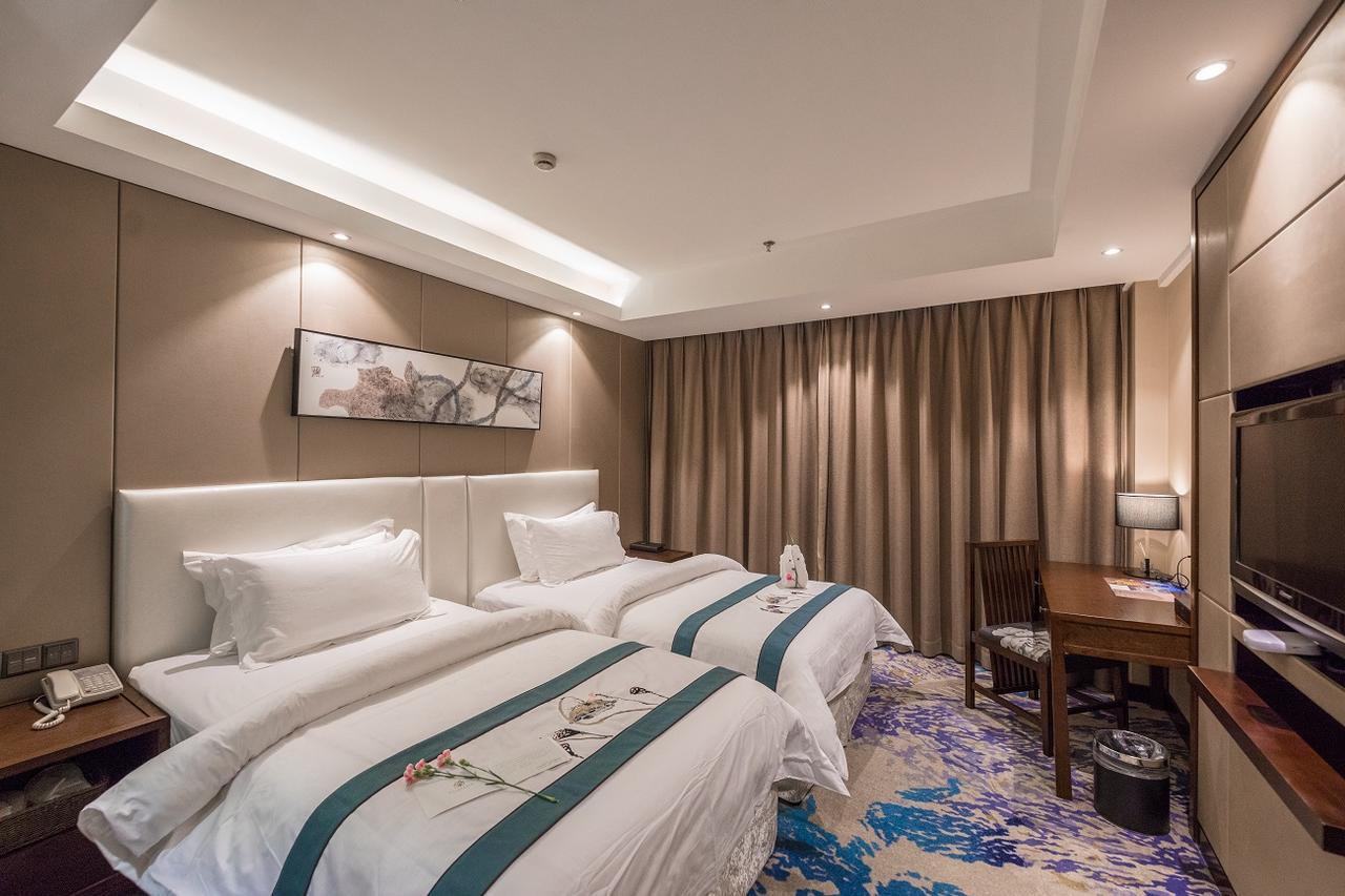 Metropolo Jinjiang Xuzhou Railway Station Suning Plaza Chudu Hotel Buitenkant foto