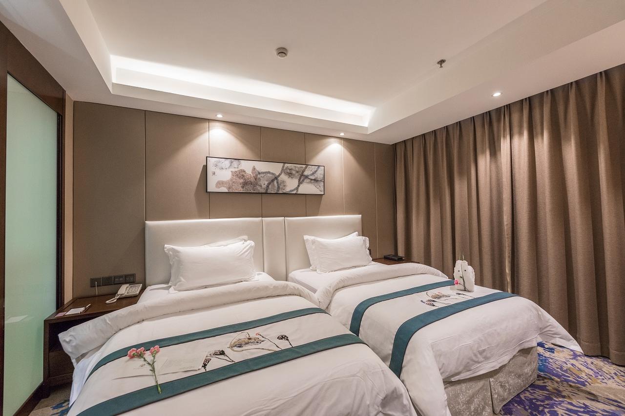 Metropolo Jinjiang Xuzhou Railway Station Suning Plaza Chudu Hotel Buitenkant foto